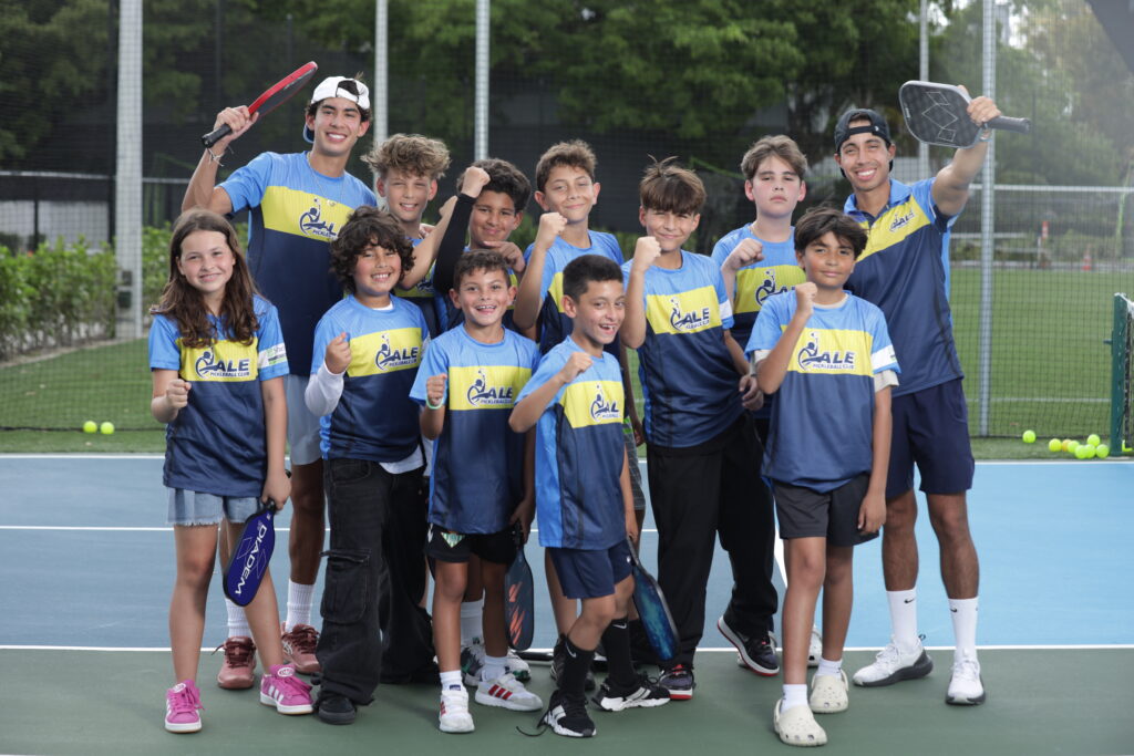 Kids and teens learning how to play pickleball