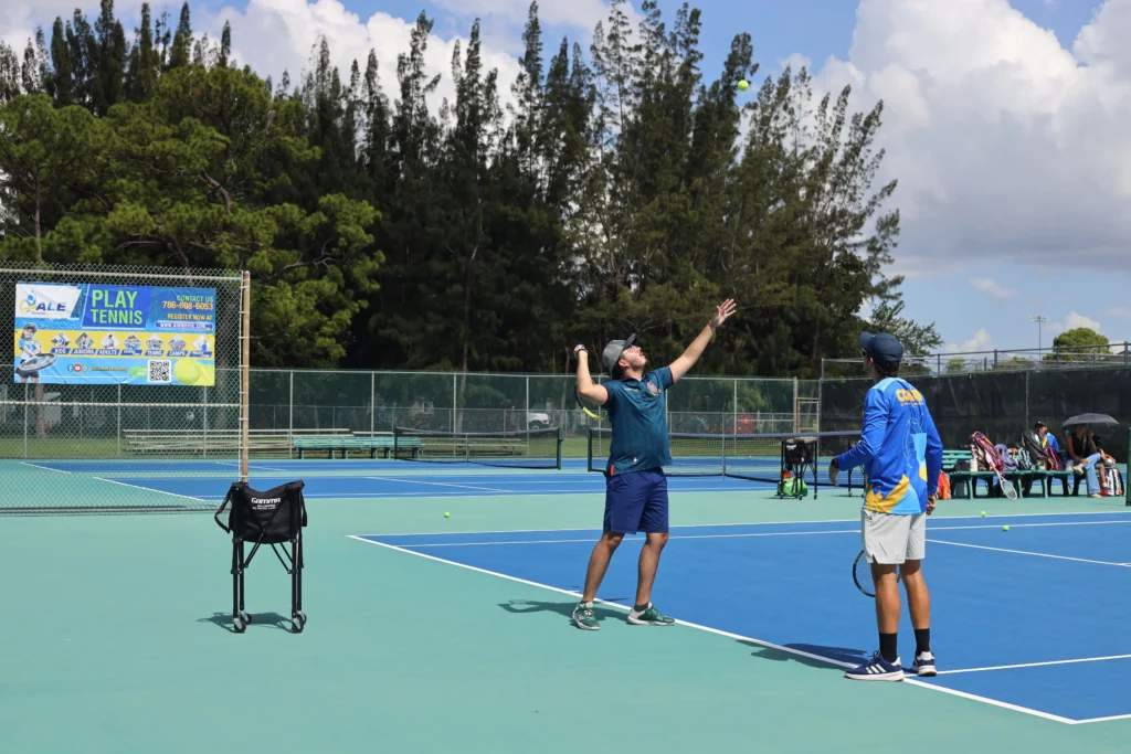 tennis instructor near me teaching a tennis lesson